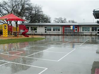 Photo of playround and outdoor classroom